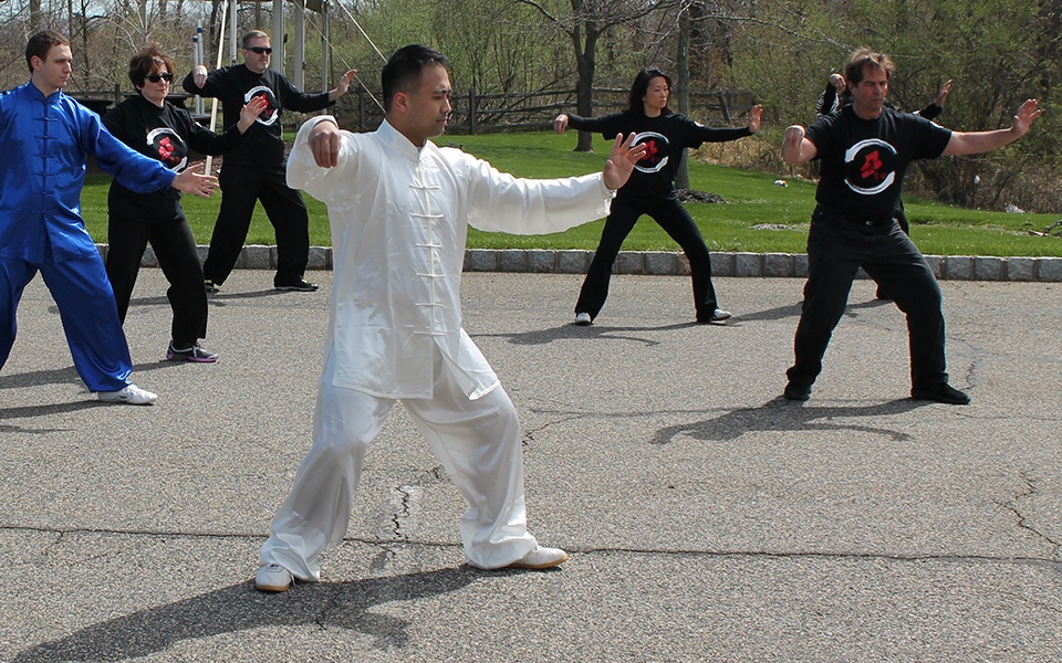 Tai Chi Teacher With Students