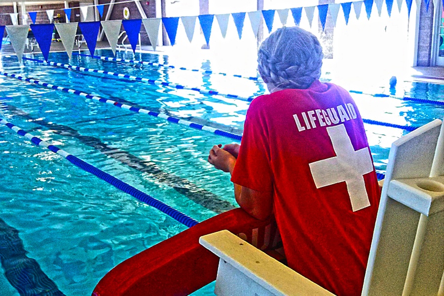 Lifeguard overlooking HQ Swim Club